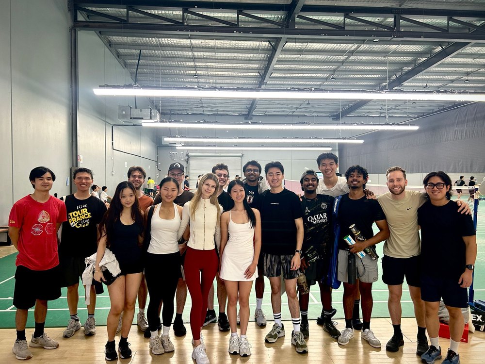 Founders lined up on a sports court